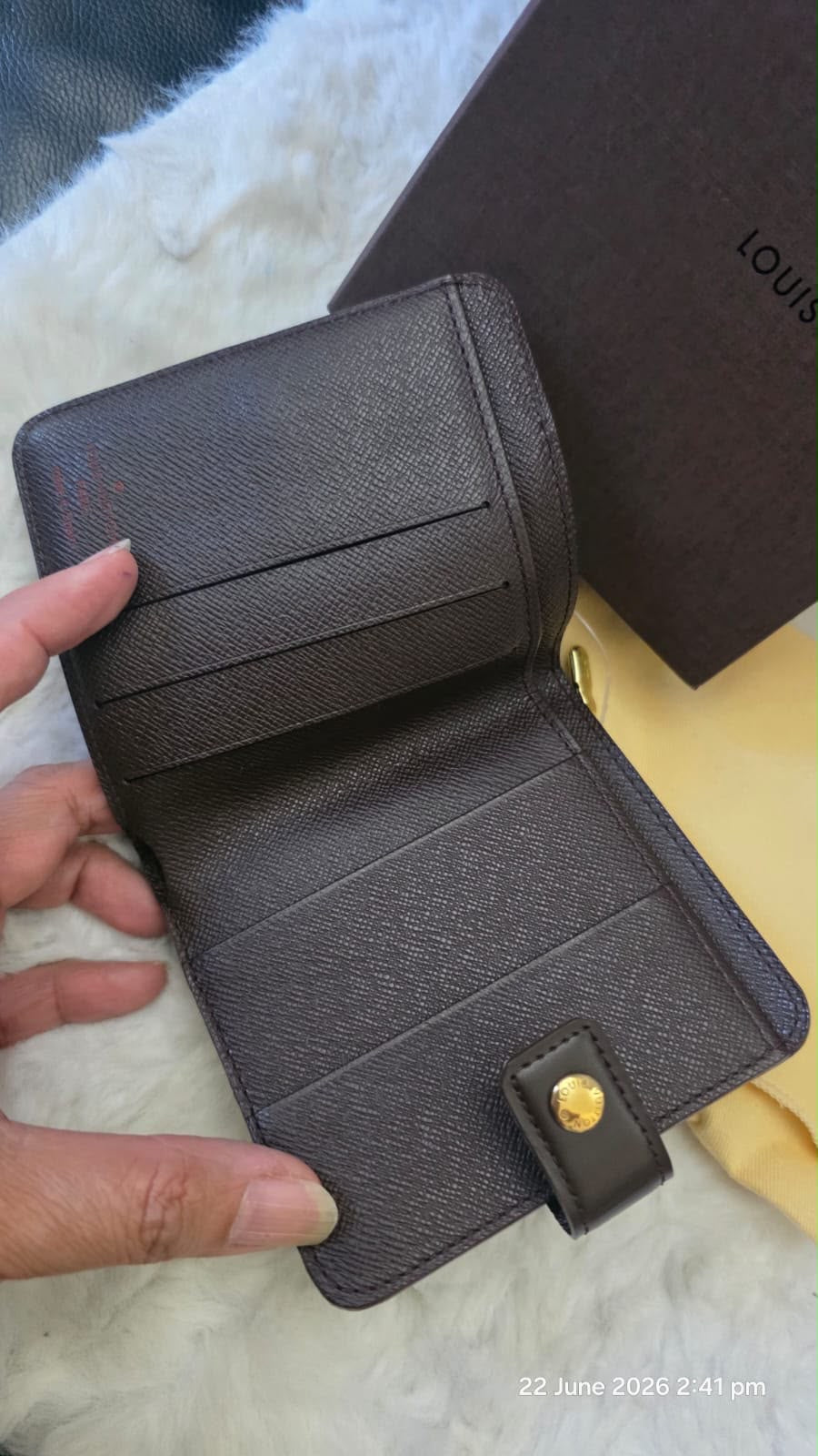 Pre owned Louis Vuitton Damier Eben Bifold zippy wallet CA0040