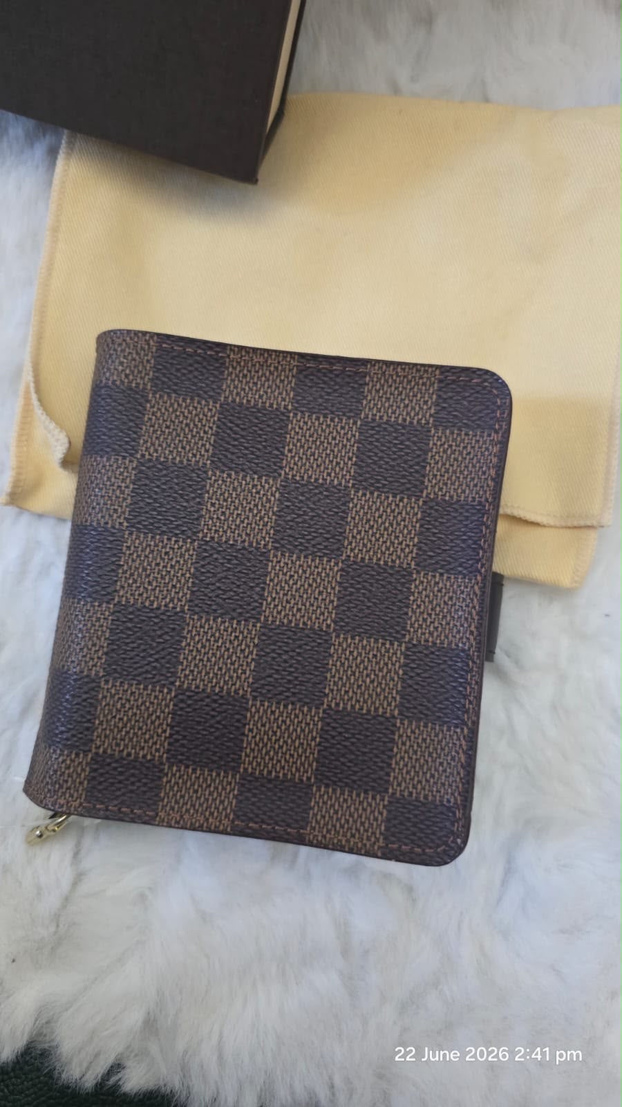 Pre owned Louis Vuitton Damier Eben Bifold zippy wallet CA0040