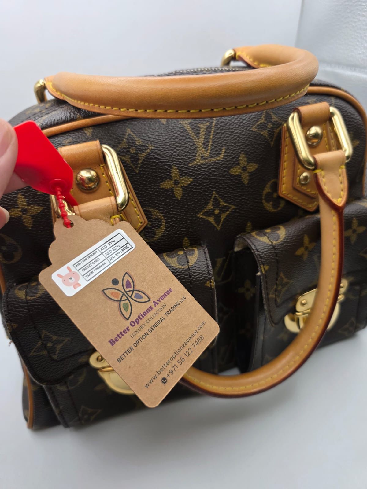Pre Owned Louis Vuitton Monogram Manhattan TH1015