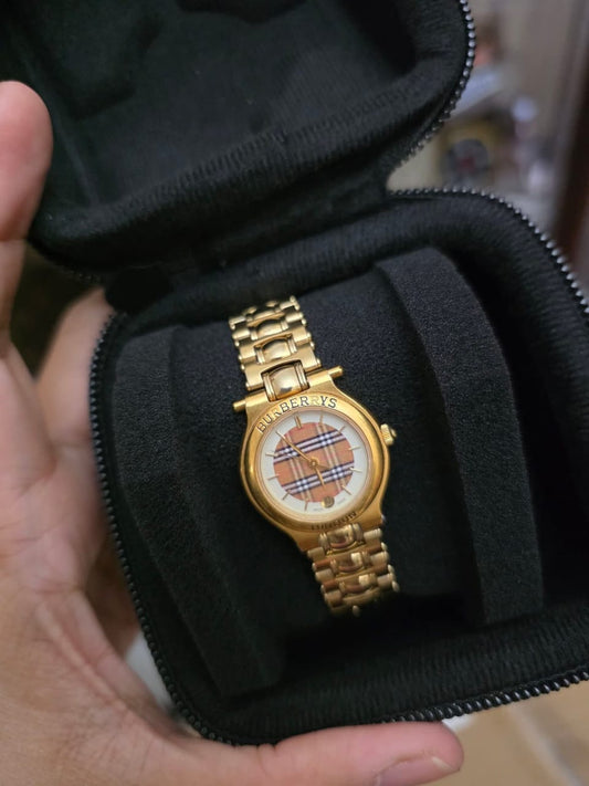 Preloved Burberry gold tone watch
