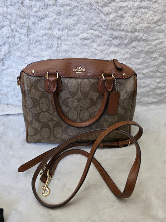 PRE OWNED MINI BENETTE COACH SATCHEL 8004835521